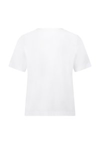 T-shirt en coton blanc avec des manches courtes, un col rond et un dos uni. Présente des coutures subtiles le long de l'ourlet et des manches.