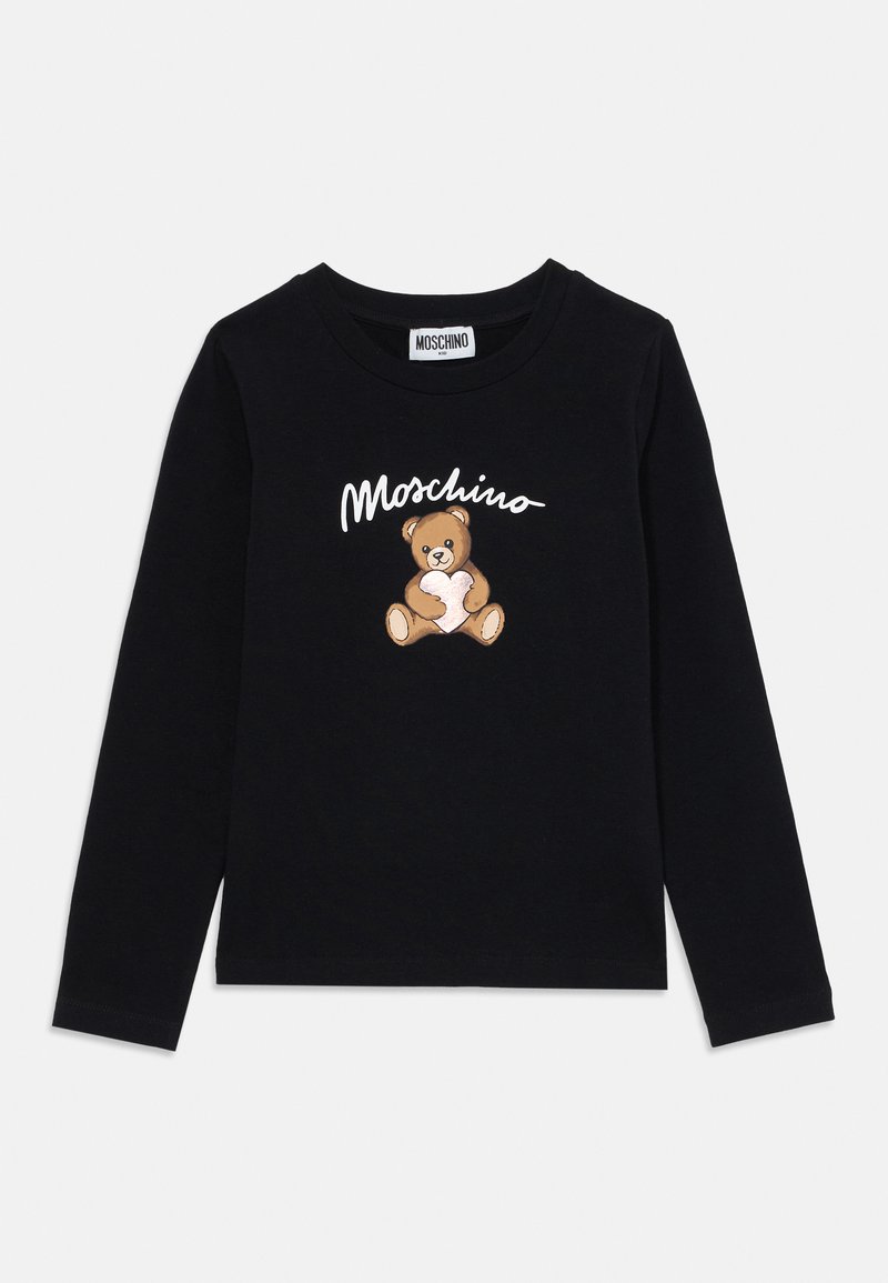 Melnu kokvilnas T-kreklu ar garām piedurknēm, kurā priekšpusē ir teddy bear grafika un balts teksts "Moschino". Vienkāršs apaļas kakla dizains.