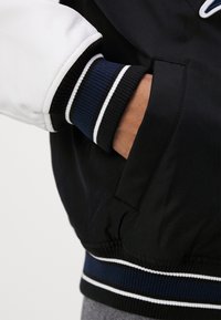 Tommy Jeans Giubbotto Bomber - black