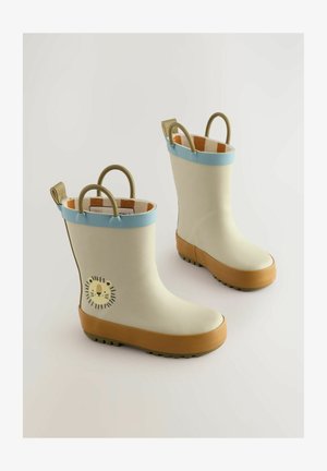 Fehér gumicsizma világoskék díszítéssel, barna talppal és oroszlán mintával a külső oldalon. Két fogantyúval rendelkezik a könnyű felhúzás érdekében.