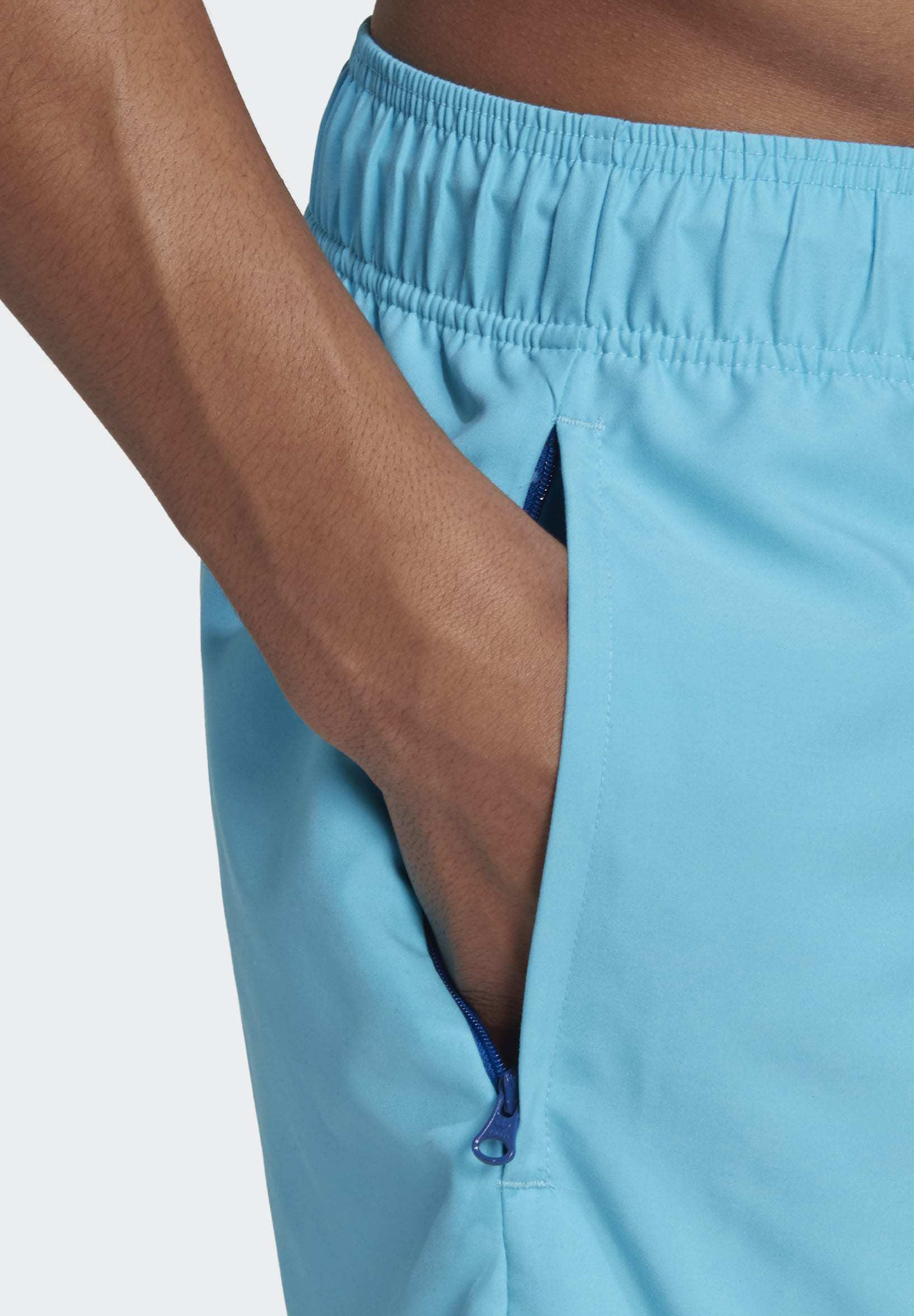 turquoise adidas shorts