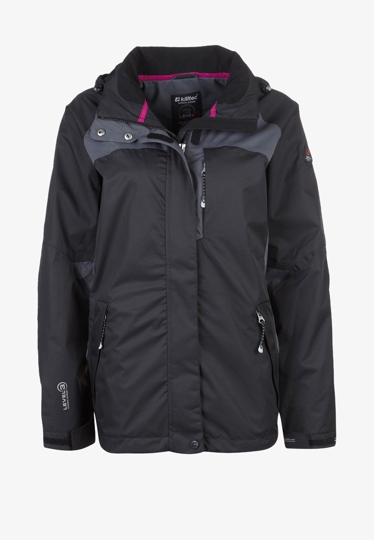 Veste d'extérieur noire et grise avec col montant, doublure intérieure rose, poches poitrine et latérales zippées, et poignets à velcro.