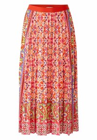 Pitkä häntäpleated-hame punaisella vyötäröllä, jossa on eloisat kukka- ja paisley-kuviot punaisissa, vaaleanpunaisissa, purppuran, vihreissä ja oransseissa sävyissä.