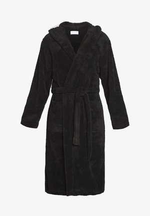 Musta huppari kylpyviitta, joka on valmistettu pehmeästä kankaasta. Siinä on pitkät hihat, kaksi etupocketia ja yhteensopiva solmio sulkemista varten.