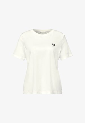 Weißes T-Shirt mit kurzen Ärmeln und Rundhalsausschnitt mit kleinem schwarzem Zebraherz-Print auf der linken Brust.