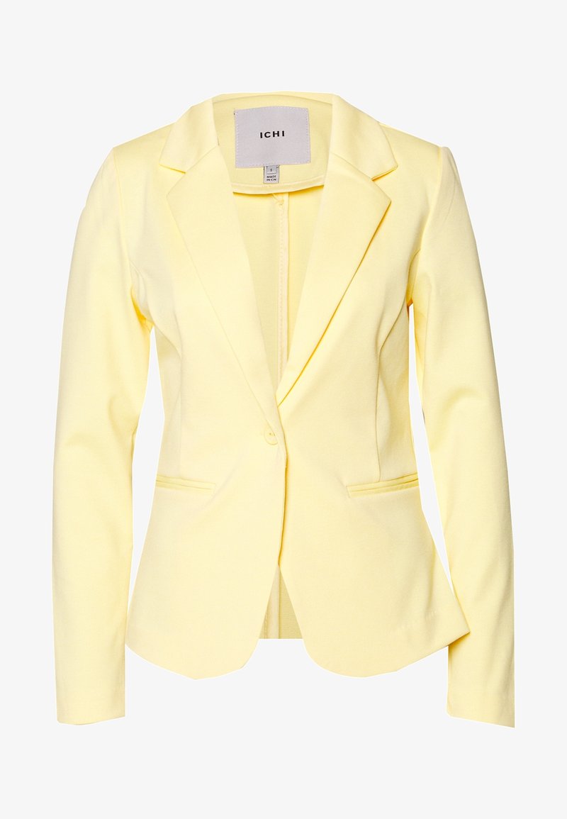 Žlutý oblekový blejzr s klopami, dvěma předními kapsami a zapínáním na jedno tlačítko. Vyrobený z hladké tkaniny se strukturovaným střihem.