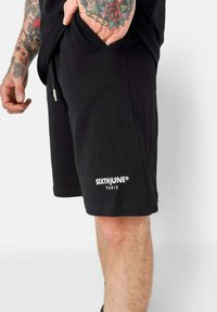 Sixth June ESSENTIEL - Pantalones deportivos - black
