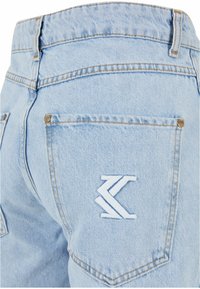 Karl Kani OG BAGGY DISTRESSED  - Relaxed fit jeans - bleached blue