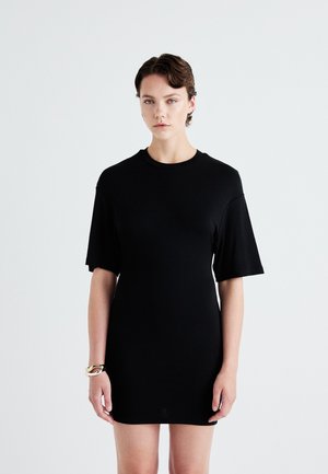 Black short-sleeve dress made of soft fabric with a relaxed fit. Features a crew neckline and falls above the knee. Simple and seamless design.