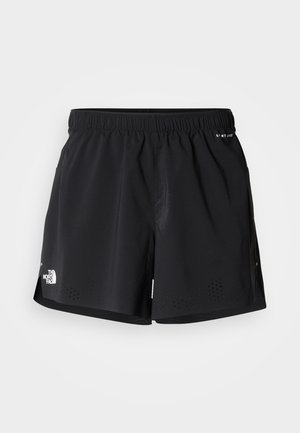 Pantaloncini sportivi neri con una cintura elastica, caratterizzati da dettagli traforati e un logo sulla gamba sinistra. Materiale leggero e traspirante.