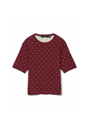 Burgundy T-shirt with short sleeves, round neckline, featuring a white polka dot pattern. Made of soft cotton material, casual design.