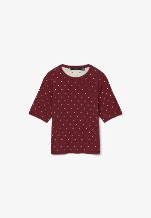 T-shirt bourgogne à manches courtes, col rond, avec un motif de pois blancs. Fabriqué en coton doux, design décontracté.