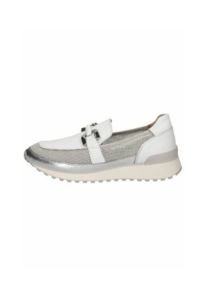 White sneaker with a mesh upper, silver accents, and a textured finish. Features a strap with a buckle detail and a thick, light sole.