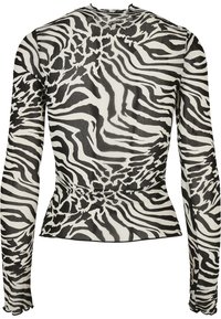 Langarmtop van doorschijnende stof met een zwart-wit zebra print. Kenmerkt zich door een getailleerde silhoët en een peplum zoom.