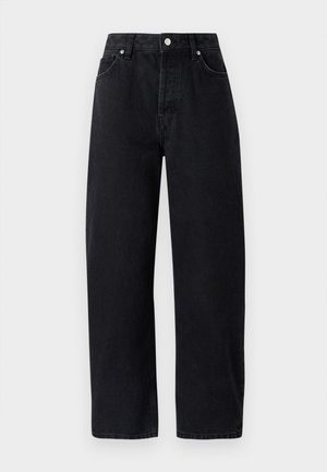 High-waisted, straight-leg black denim jeans with five pockets, metal rivets, and tonal stitching. Smooth texture, minimalistic design.
