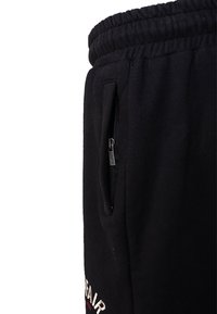 UNFAIR ATHLETICS Spodnie treningowe