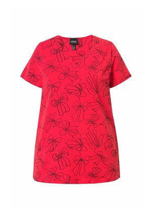 Blusa corta rossa a maniche corte con un motivo di contorni neri a forma di fiocchi. Collo rotondo e vestibilità dritta, realizzata in un tessuto leggero.