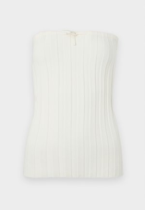 Hvid ribbet strikket strapless top med en lille bundet sløjfe detalje i midten af den øverste kant.