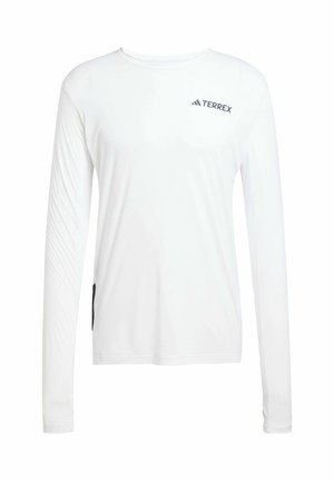 Camiseta deportiva de manga larga blanca con cuello redondo, que presenta un logo negro de Terrex y un bolsillo lateral con cierre de cremallera. Tejido suave y ligero.