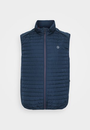 Marineblaue ärmellose Weste mit horizontaler Steppstruktur, hohem Kragen, Frontreißverschluss und seitlichen Taschen. Mit einem Logo auf der Brust.