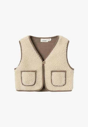 Beige fliissekeste v-kaelusega, pruuni äärisega ja kahe eesmise taskuga. Omab ühte nööpi kinnitust. Pehme tekstuur, juhuslik disain.