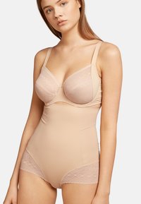 Beige korzetový body s krajkovými detaily, s kosticemi, nastavitelnými ramínky a hladkým, bezšvovým designem.