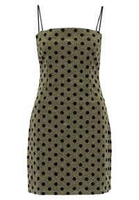 Olivgrön klänning med svarta prickar, strukturerad form, spagettistappar och textil med struktur för extra detalj.