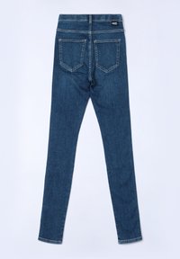 Smala denimjeans i mörkblått, med mitt högt midja, femfickorsdesign och sömnadsdetaljer på bakfickorna.