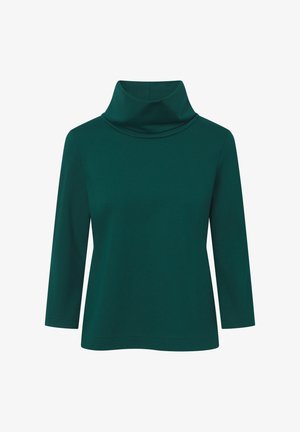 Türkis sinise pika varrukaga pluus, millel on torukujuline kaelus. Valmistatud siledast ja venivast kangast, omab vabalt langevat lõiget ja mitmekülgset disaini kihitamiseks.