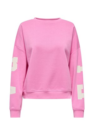 Sweat-shirt rose à col rond avec épaules tombantes et grandes lettres blanches en bloc partiellement visibles sur les deux manches.