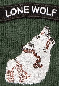Green fabric featuring an embroidered white howling wolf with brown accents and the text "LONE WOLF" above in a black patch.