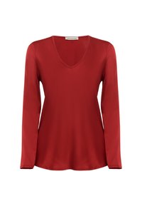Blusa rossa a maniche lunghe realizzata in tessuto liscio, caratterizzata da un collo a V e una vestibilità rilassata. Design minimale senza motivi o accenti visibili.