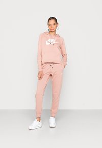 Nike Sportswear Calças de fato de treino - rose whisper/white