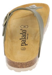 Sandalo con soletta in sughero e cinturino verde, soletta beige, leggero supporto per l'arco e suola in gomma bianca. Marchio visibile sulla soletta.