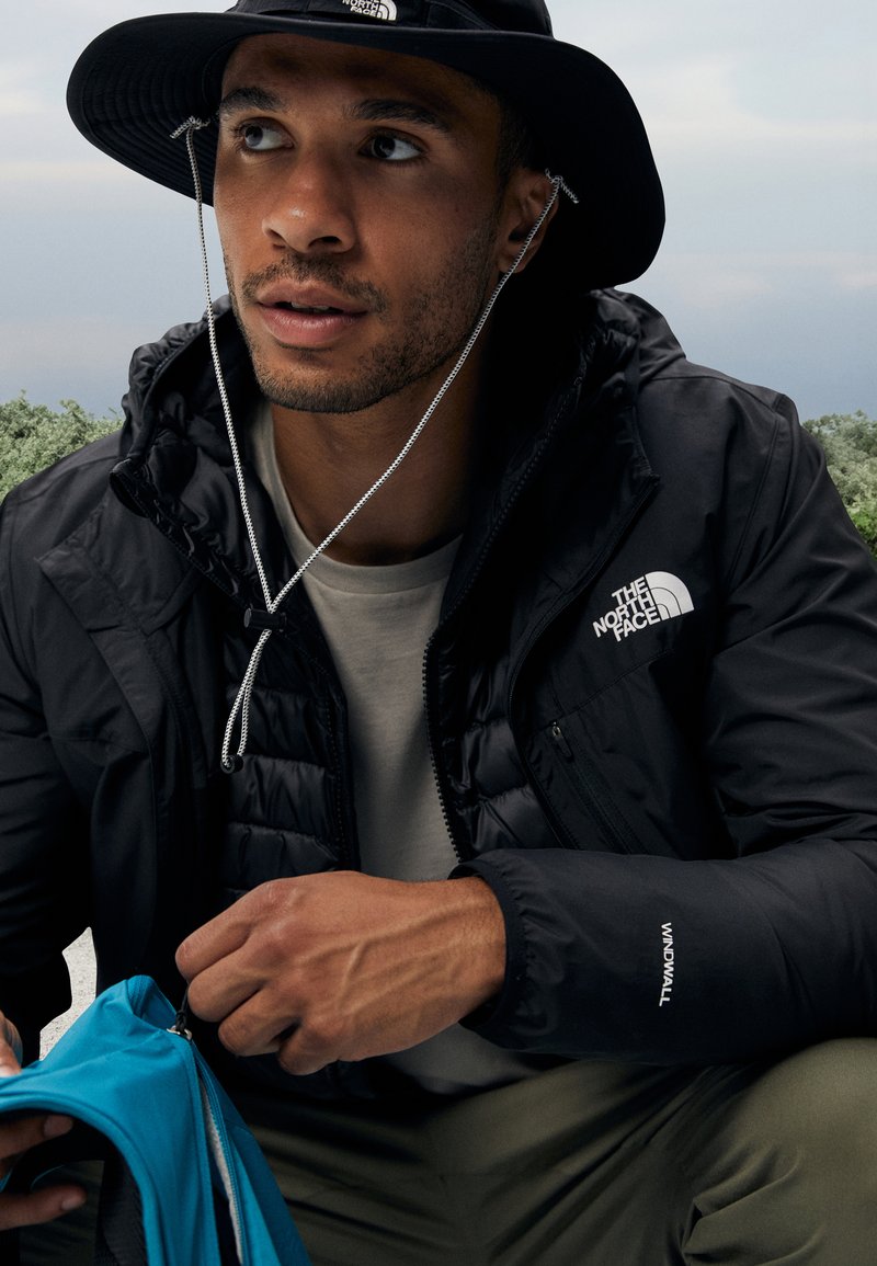 The North Face HIGHER RUN WIND JACKET - Veste coupe-vent - black/noir - ZALANDO.FR