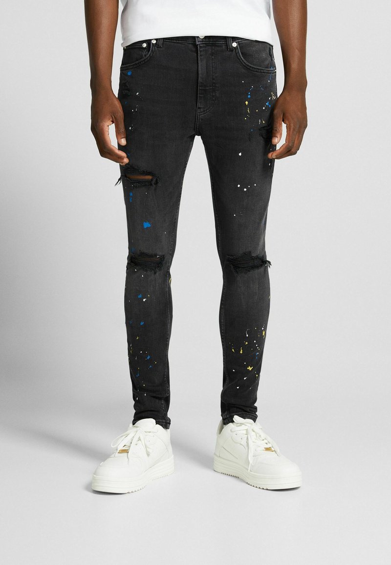 Bershka SUPER RIPPED PAINT SPLATTER Jeans Slim Fit black/schwarz