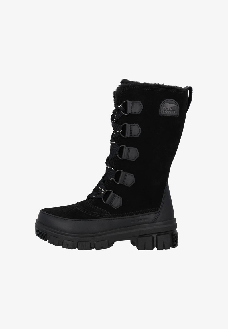 Black waterproof winter boots with a suede upper, fur collar, and rubber sole. Features lace-up design with hexagonal eyelets and logo patch.