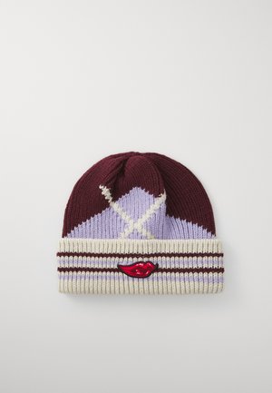 Knit beanie in maroon, lavender, and cream. Features argyle pattern and embroidered red lips logo on cream band. Textured yarn.