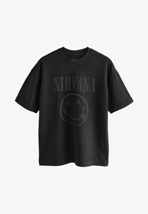 Black cotton t-shirt with short sleeves featuring a printed Nirvana logo and smiley face design made of small studs on the front.
