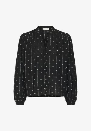 Fekete hosszú ujjú blúz fehér, függőleges pöttyös vonalakkal és kis négyzetmintákkal, gombos elöl, kerek nyakkivágással.