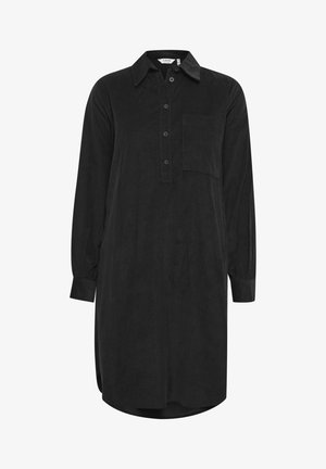 Zwarte shirtjurk van zacht materiaal, met een knoopsluiting aan de voorkant, kraag, lange mouwen en een borstzak. Soepele textuur; knielang.