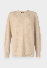 Suéter de punto acanalado beige con escote en V, mangas largas y un ajuste holgado. Presenta un tejido texturizado y acanalado en el escote, los puños y el dobladillo.