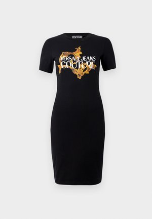 Black fitted dress with short sleeves featuring gold and white "VERSACE JEANS COUTURE" logo and intricate gold patterns on the front.