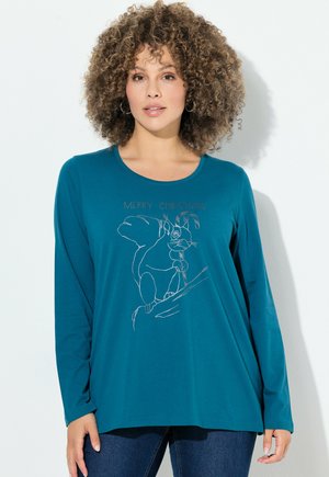 Langärmliges türkisfarbenes Shirt aus weichem Stoff mit einem weißen Grafikdruck eines Cartoon-Hasen und dem Text "Frohe Weihnachten".
