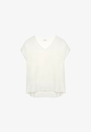 Biała, krótko rękawowa bluzka z dekoltem w serek, wykonana z gładkiego materiału. Posiada luźny krój i lekko zaokrąglony dół.