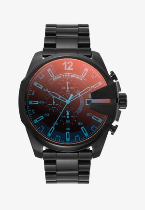 Black metal wristwatch with orange and blue gradient dial, three subdials, date display, and "Only The Brave" text under 12 o'clock.