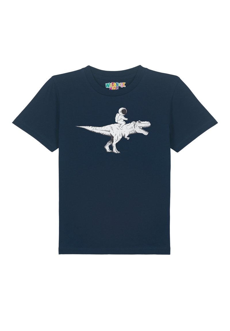 T-shirt en coton bleu marine avec un graphique représentant un astronaute chevauchant un dinosaure, le tout en contour blanc. Manches courtes et col rond.