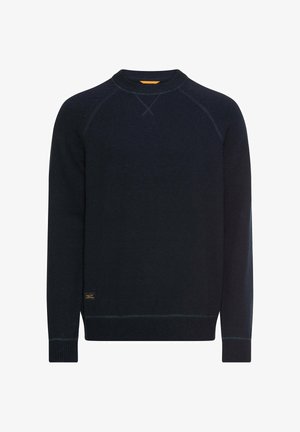 Marineblauwe trui met ronde hals, voorzien van geribde manchetten en zoom, zachte stoftextuur en contrasterende stikseldetails op de mouwen. Klein logolabel aan de onderkant.
