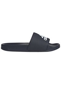 Chausson de plage navy avec une sangle texturée, arborant un logo blanc. Fabriqué en matériau synthétique, il dispose d'une semelle extérieure lisse et d'une semelle intérieure moulée.