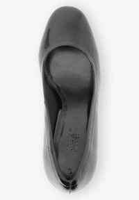 Black patent leather pump with a rounded toe, smooth texture, and minimalistic design. Interior features a cushioned footbed for comfort.